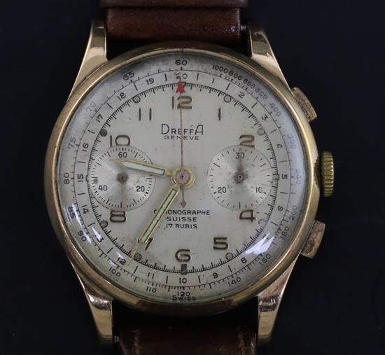 A gentlemans Dreffa Geneve 18ct gold manual wind chronograph wrist watch, with silvered dial, on associated leather strap